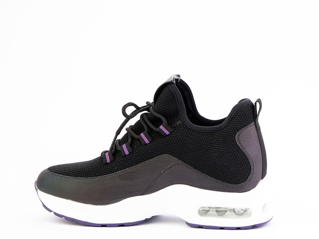 Womens black and purple hiking boots isolated white background Left side view