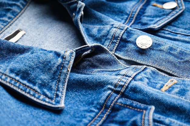 Womens blue jean jacket close-up