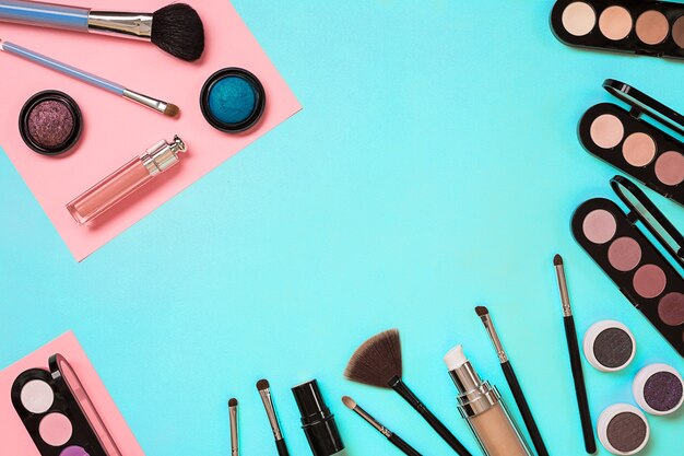 The womens cosmetics set on a blue background modern woman