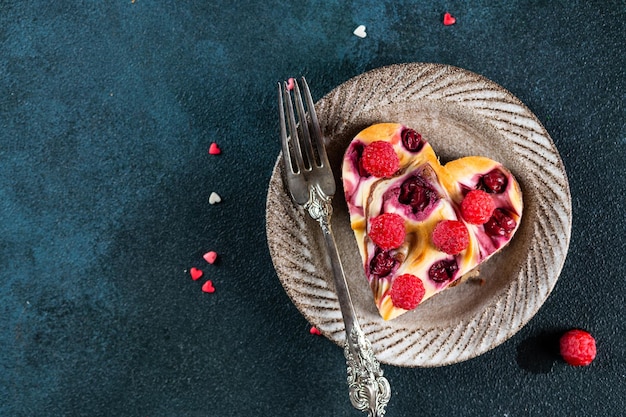 Womens day dessert. Heart shaped cheesecake brownie with cherry. Mothers Day dessert. Fathers day dessert. Womens day cake. Heart cheesecake. Heart cake.