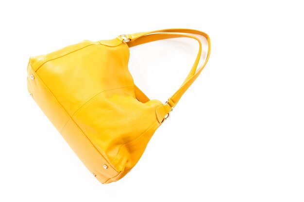 Photo womens yellow bag on a white background.