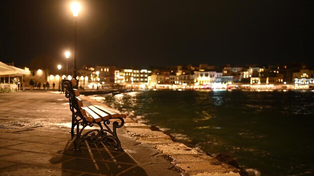 Wonderful atmospheric view of the bay in the old town of Chania in Greece, Crete. Waves crash on the pier.