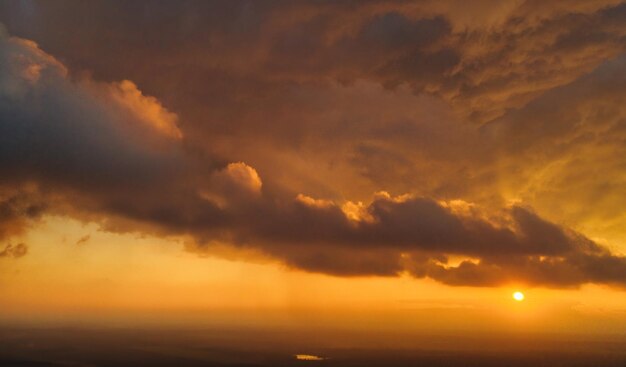 A wonderful dawn above the clouds natural background