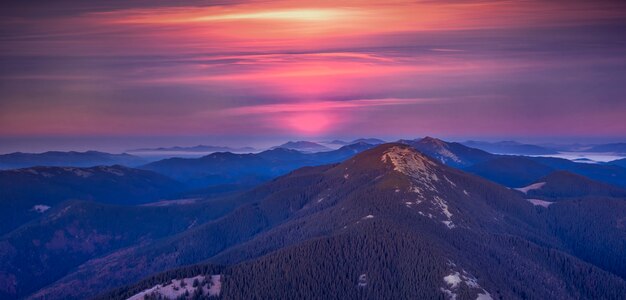 Wonderful dawn in the mountains. Fog on top.