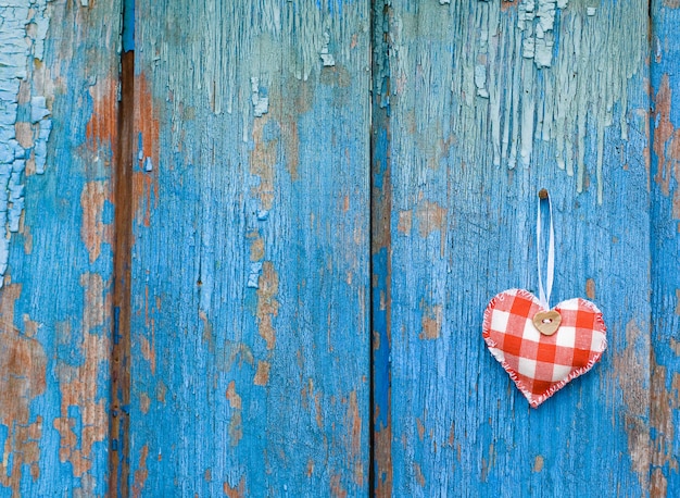 Wonderful heart on blue wood