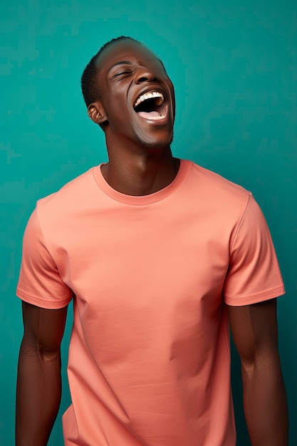 Wonderful strong guy screaming indoor shot of happy african man in casual tshirt
