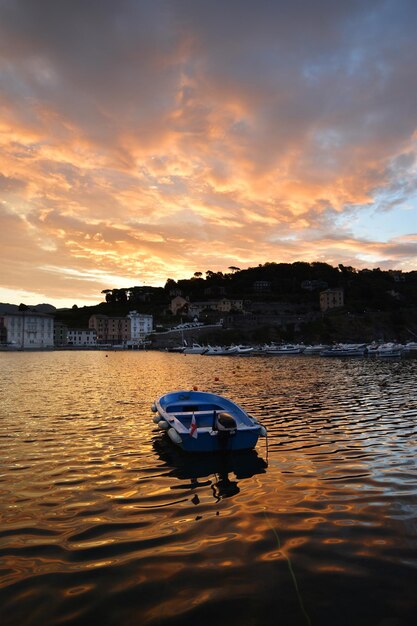 Wonderful sunrise on the beach of the Bay of Silence in Liguria a dream atmosphere