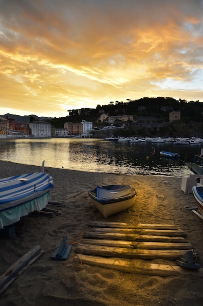 Wonderful sunrise on the beach of the Bay of Silence in Liguria a dream atmosphere