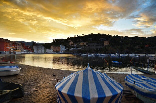 Wonderful sunrise on the beach of the Bay of Silence in Liguria a dream atmosphere