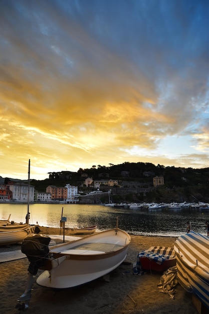 Wonderful sunrise on the beach of the Bay of Silence in Liguria a dream atmosphere