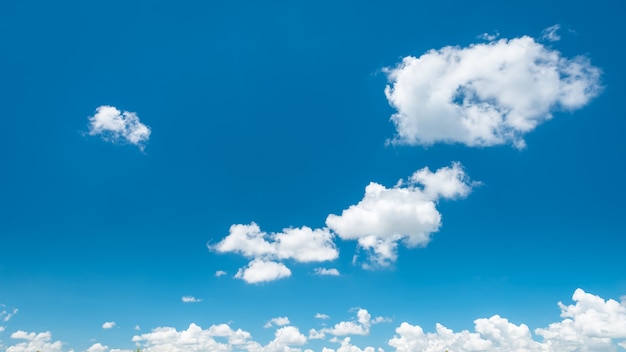 Wonderful white cumulus clouds on blue sky