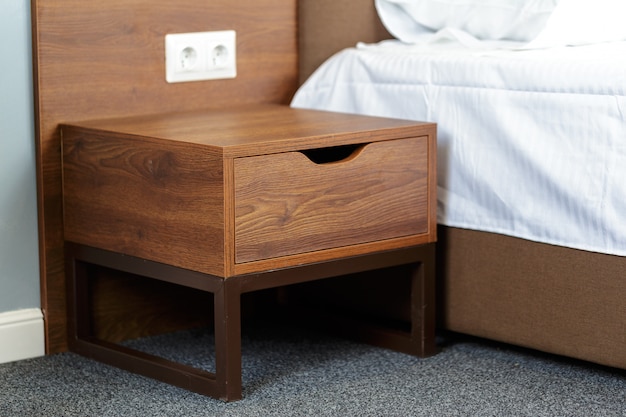 Wood bedside table. Modern designer