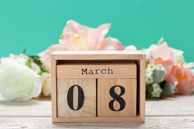 Wood blocks in box with date, day and month 8 March. Wooden blocks calendar