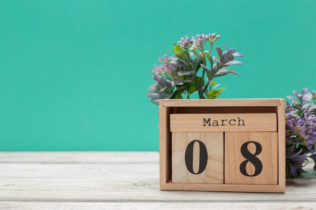 Wood blocks in box with date, day and month 8 March. Wooden blocks calendar