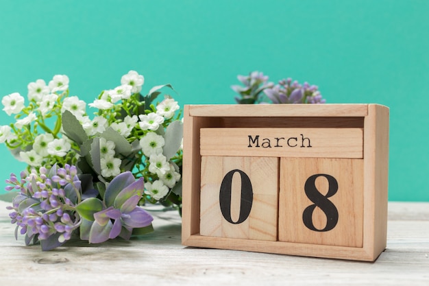 Wood blocks in box with date and flowers