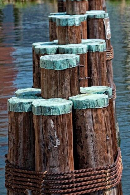 Photo wood  bollard in baltimore harbor