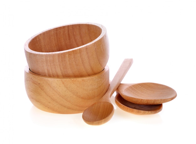 Wood bowl and spoon isolated on white.