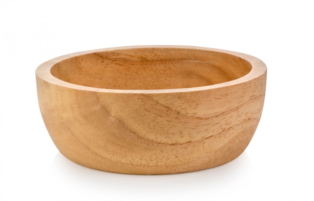 Wood bowl on white wall. 