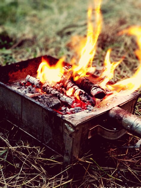 Photo wood burning stove on field