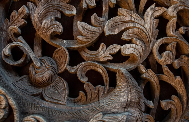 Wood carving,a plank of old carved wood from an old zanzibar
door in stone town zanzibar sold