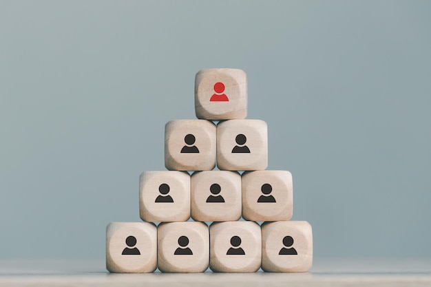 Photo wood cube block with organizational leader working as a team