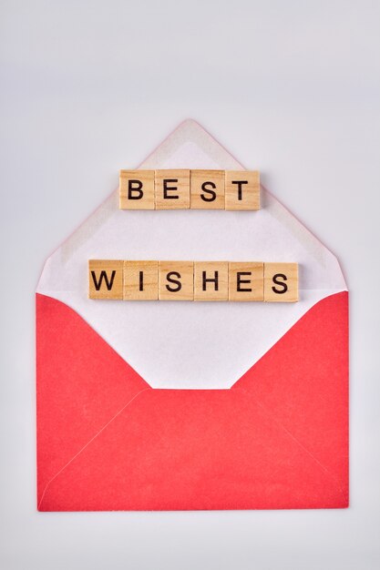 Wood cubes best wishes. Vertical shot white background.