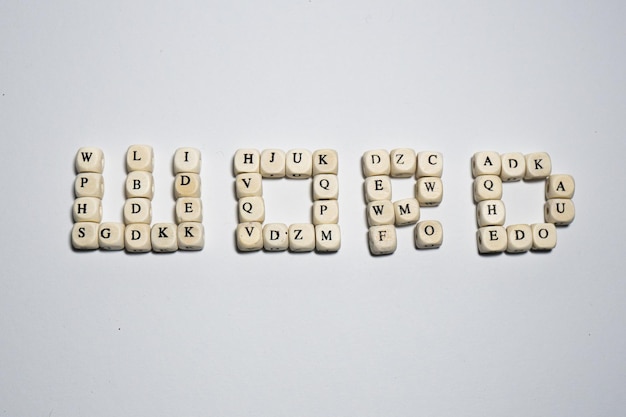 Foto cubi di legno con lettere parola alfabeto sfondo del testo