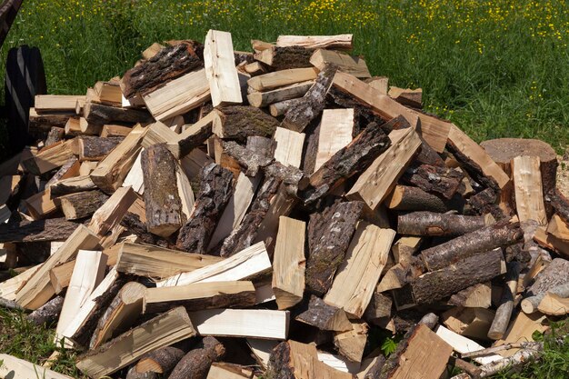 Wood cut into logs for use in a stove or fireplace