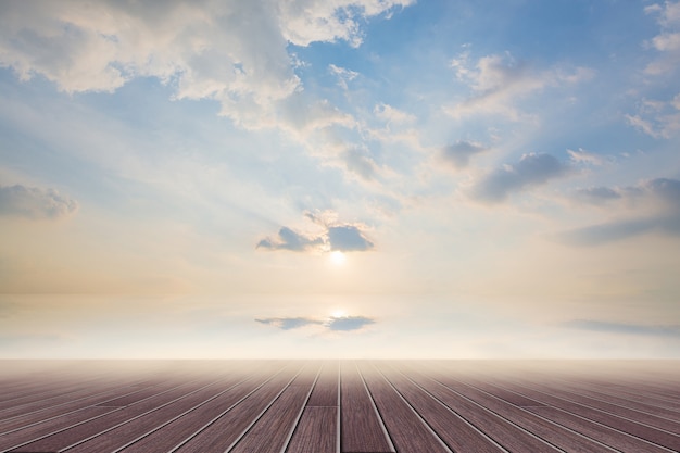 Wood floor and daytime sky backdrop