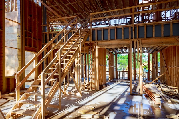 Wood frame of house under beam construction