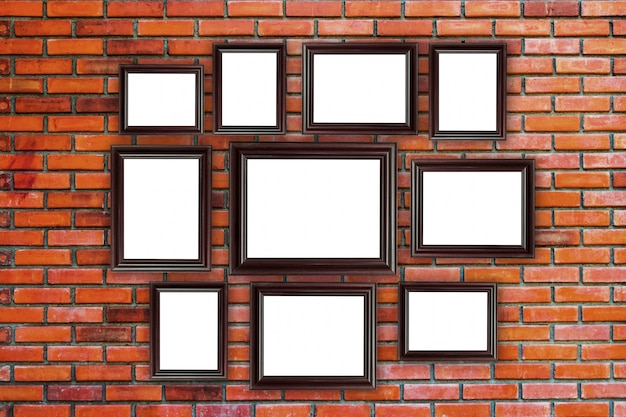 wood frames photo on red brick wall