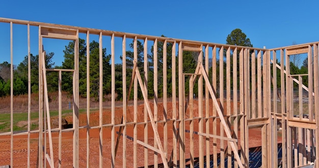 Wood framing beam of new house under construction exterior