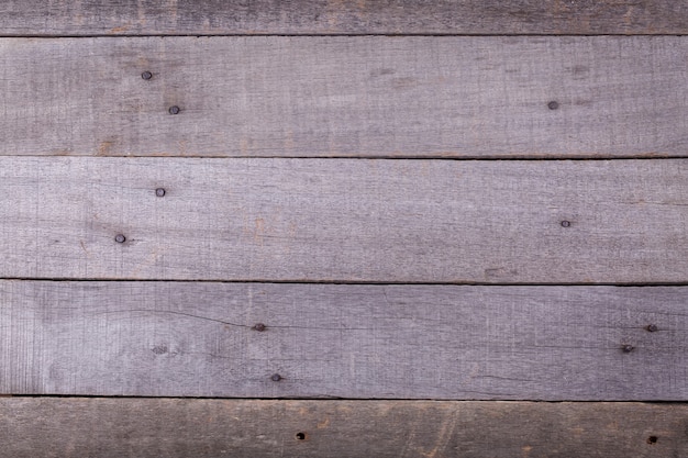 Wood grey grain texture, dark wall background, top view of wooden table