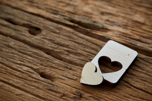 Wood heart Valentine on wooden