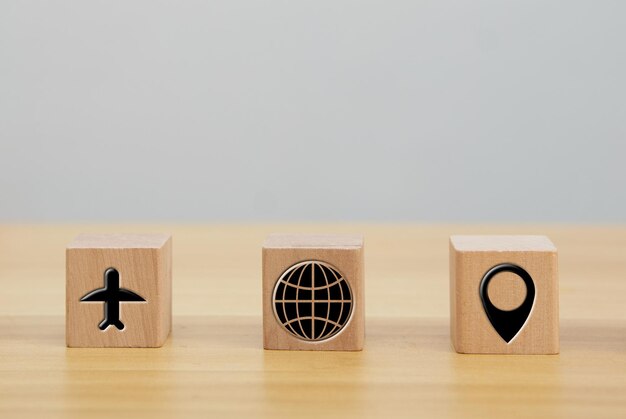 Wood icon cube for travel trip plane globe and bookmark person