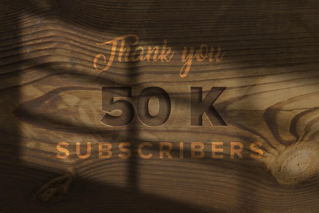 Photo a wood panel with the words 50k on it