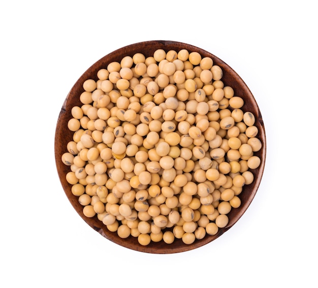 Photo wood plate of soybeans isolated on white background