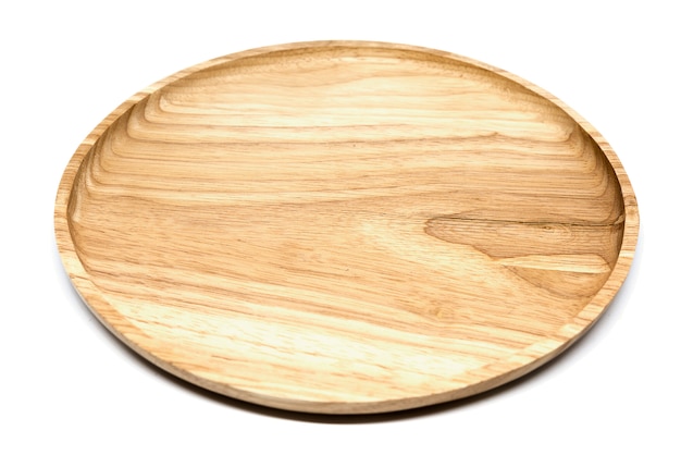 白い背景の上の木の皿