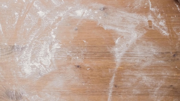 Wood prep table covered with flour.