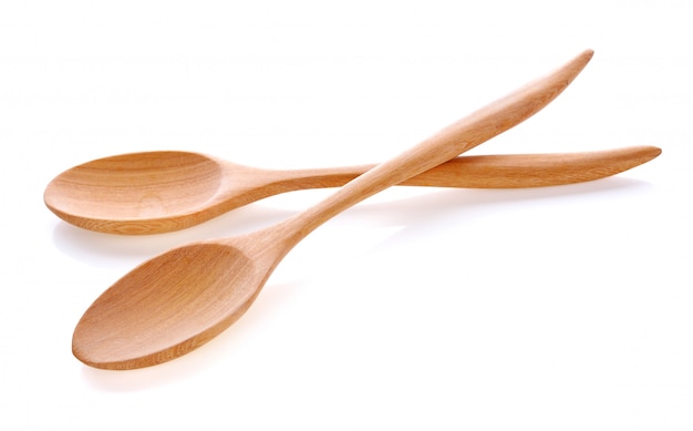 Wood spoon isolated on white.
