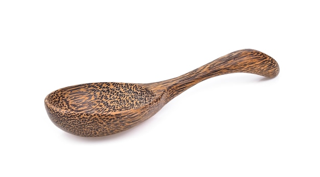 Wood spoon on white space