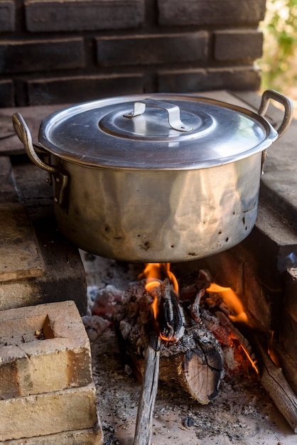 Wood stove with aluminum pan.