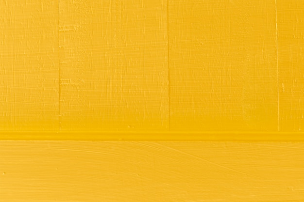 Wood surface with yellow color paint