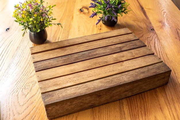 Wood table on blur of cafe coffee shop bar