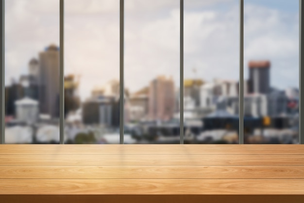 Photo wood table in city center modern office background