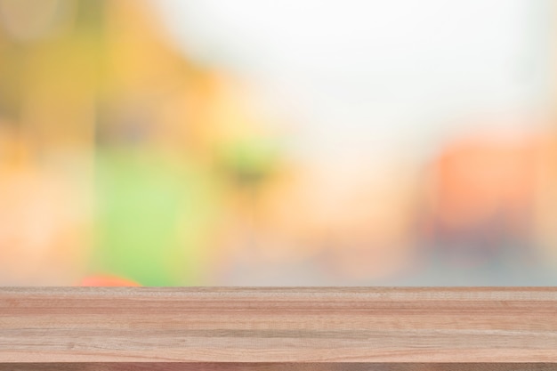 Wood table top on blur  background