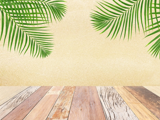 Wood table top on blurred beach background with green palm leaf, summer concept