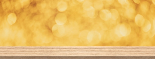 Wood table top, gold glitter bokeh abstract background for product and display montage ban