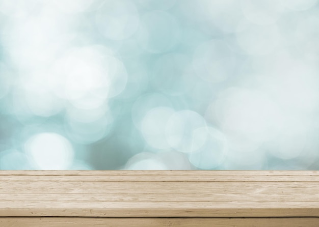 Wood table top on white bokeh abstract background - can be used for montage or display your products