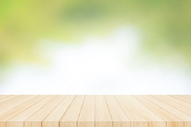 Wood table top on with blur glass window wall 